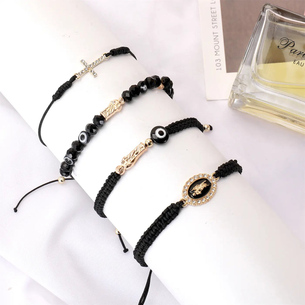 Set de 4 Bracelets Sacrés "Protection Divine & Foi" – Croix Strass, Saint Jude & Œil Protecteur (Paiement à la Livraison)